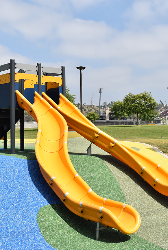 Image of one of the slides at the river park playground.