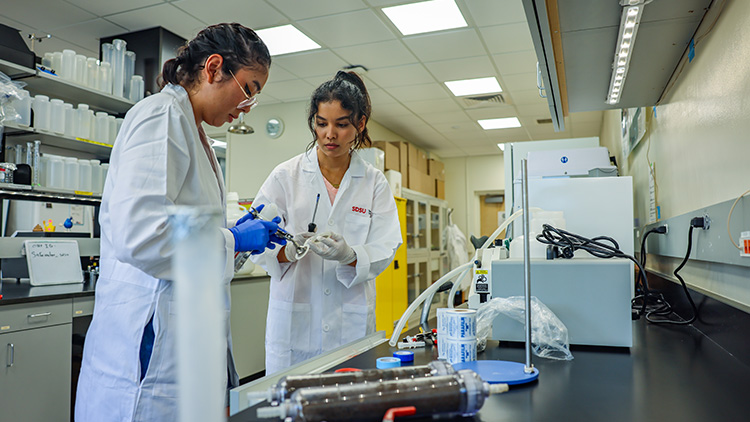 Students in Matthew Verbyla's lab prepare for an experiment